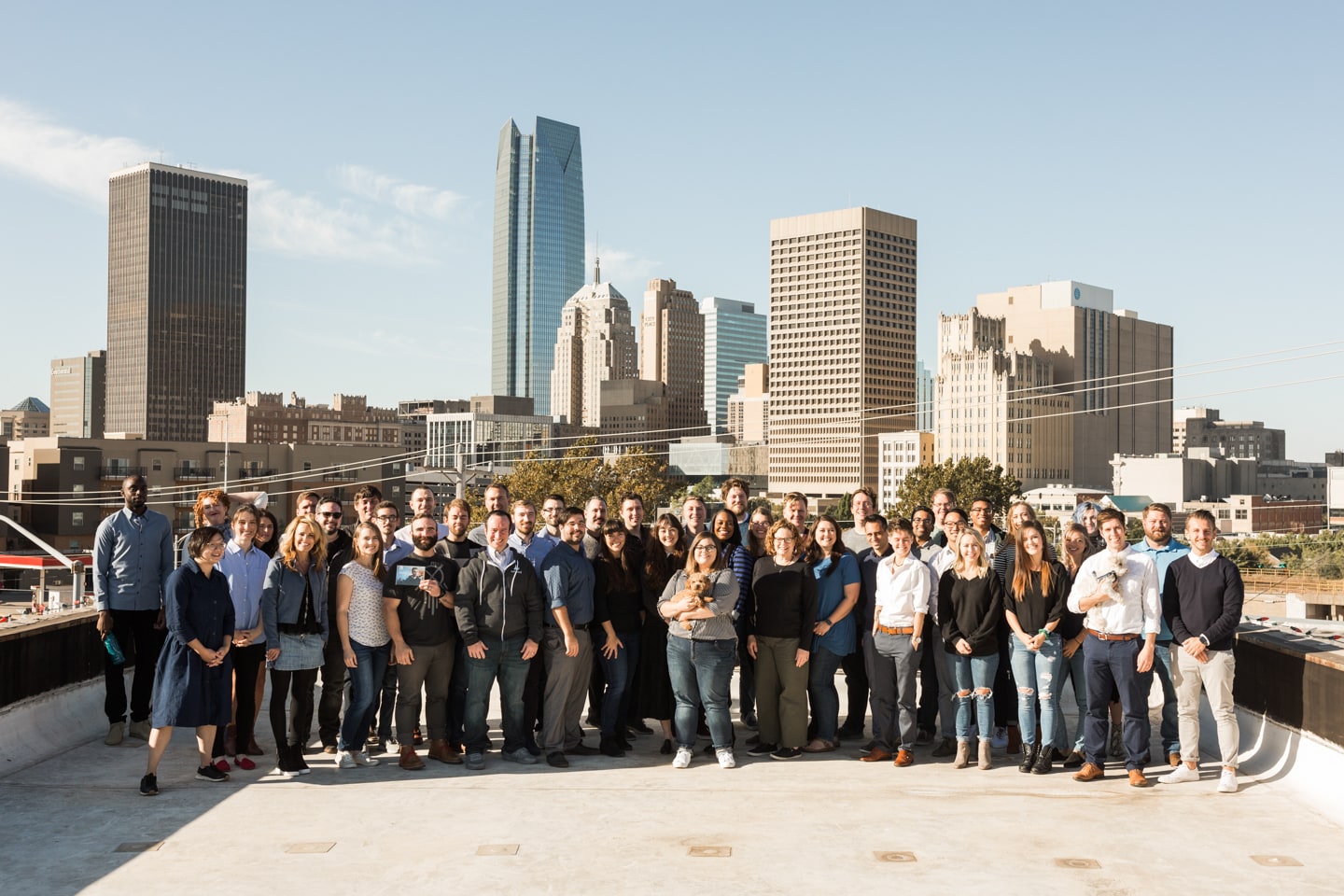 Full team photo in OKC office